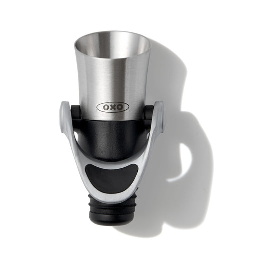OXO wine bottle stopper on a white background